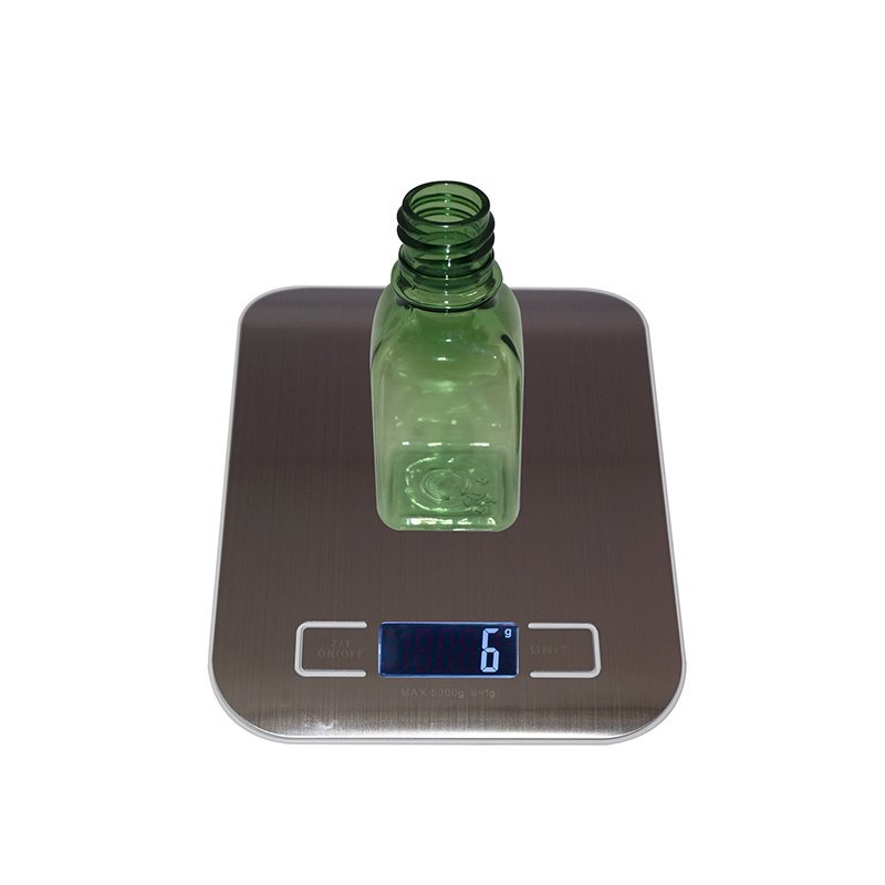 Small square PET plastic bottle in semi green color with screw cap +CPPET0RBT007018003300102YM