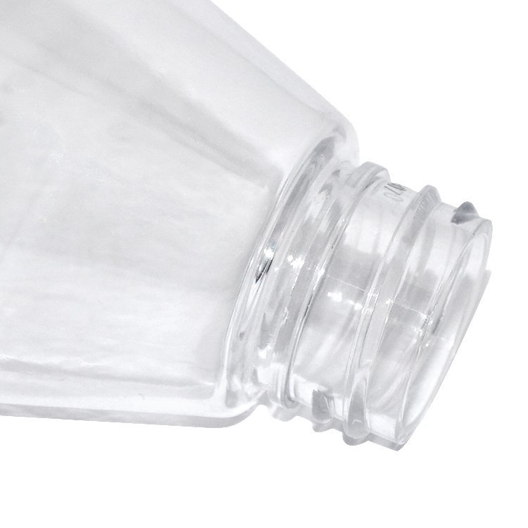 Wholesale 500ml custom special shape design clear cosmetic bottle PET plastic shampoo bottle with plastic lotion pump